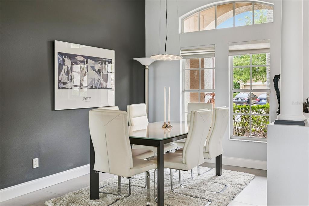 1652 Cherry Ridge Drive Lake Mary, FL 32746 - Photo 9 of 62 a view of a dining room with furniture and a window