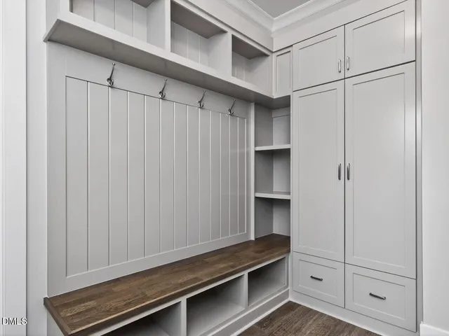 a utility room with cabinets