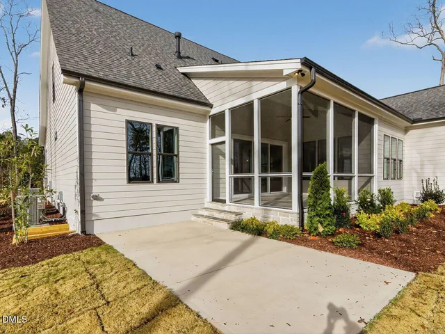 a house view with large trees