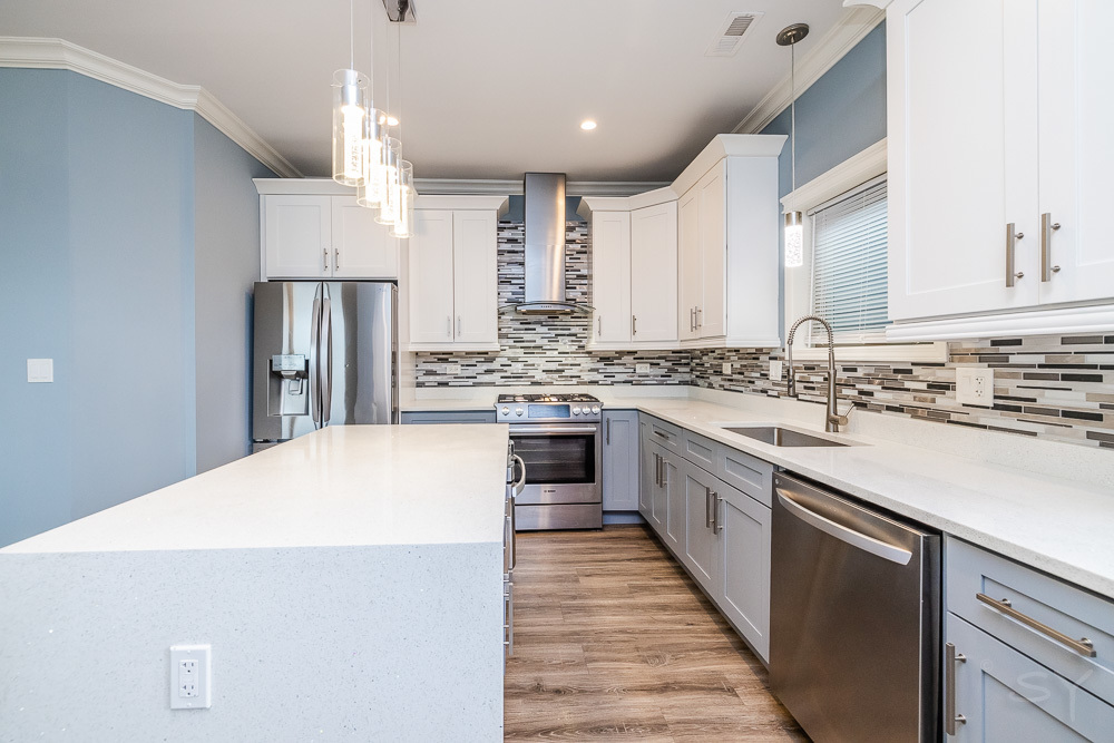 1300 South Heath Avenue Chicago, IL 60608 - Photo 12 of 55 a kitchen with stainless steel appliances a refrigerator sink and cabinets
