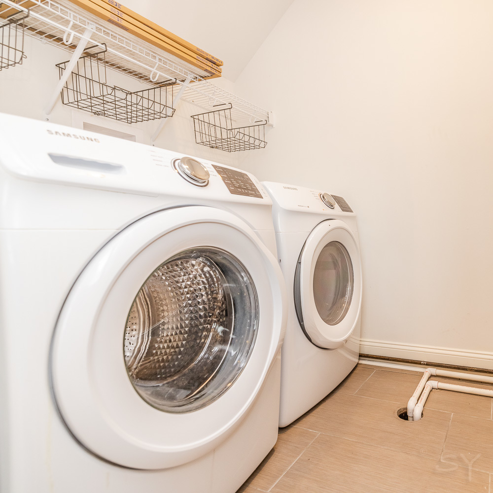 1300 South Heath Avenue Chicago, IL 60608 - Photo 22 of 55 a utility room with dryer and washer