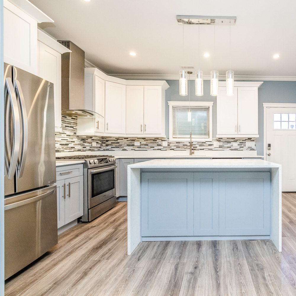 1300 South Heath Avenue Chicago, IL 60608 - Photo 8 of 55 a kitchen with a sink stove and refrigerator