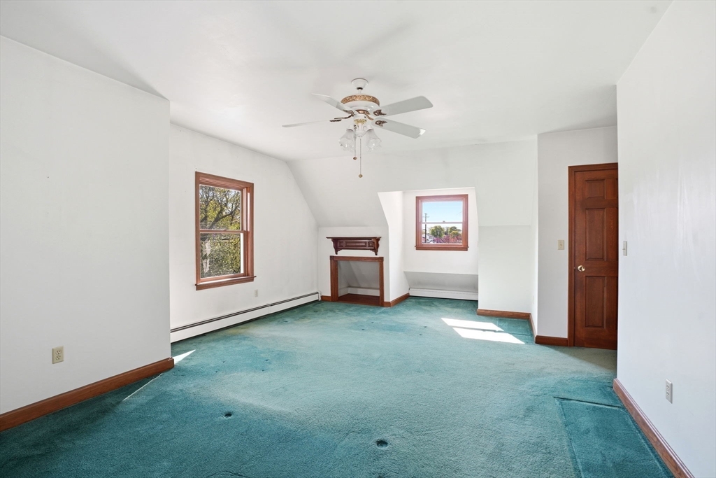 67 Wituwamat Road Weymouth, MA 02191 - Photo 30 of 42 wooden floor in an empty room with a window