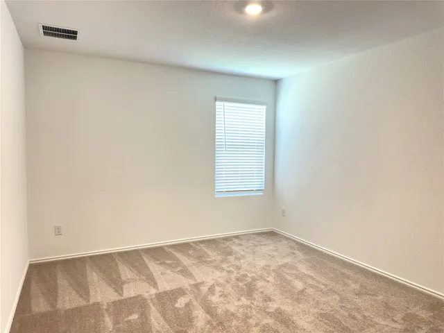an empty room with a natural light