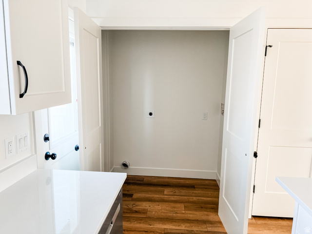 522 West 2000 South Vernal, UT 84078 - Photo 15 of 18 Laundry area with dark wood-style floors and hookup for an electric dryer