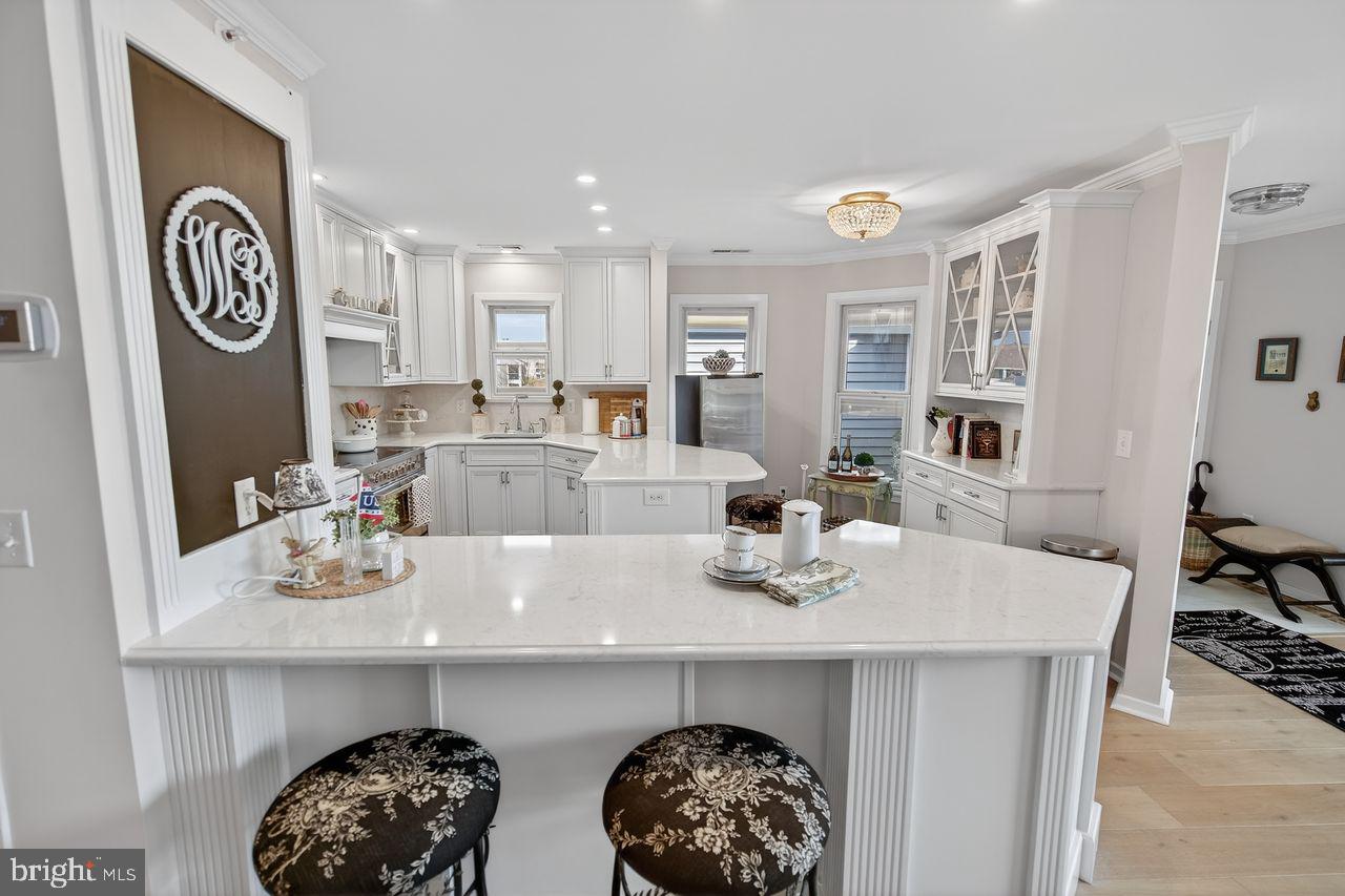 30470 Shore Lane, Unit 5 Ocean View, DE 19970 - Photo 31 of 56 Cabinet Details Include Column Trim.