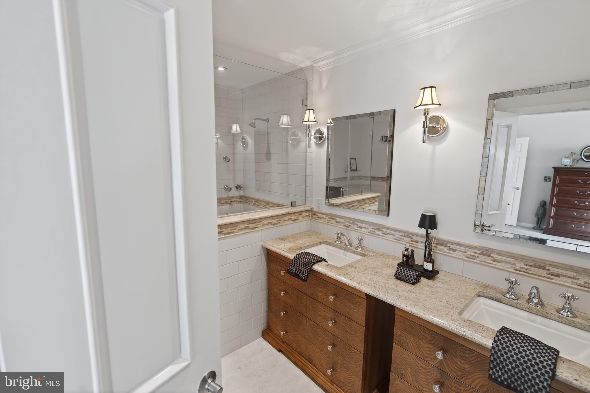 30470 Shore Lane, Unit 5 Ocean View, DE 19970 - Photo 37 of 56 Granite Counters Top Custom Tiger Wood Vanities.