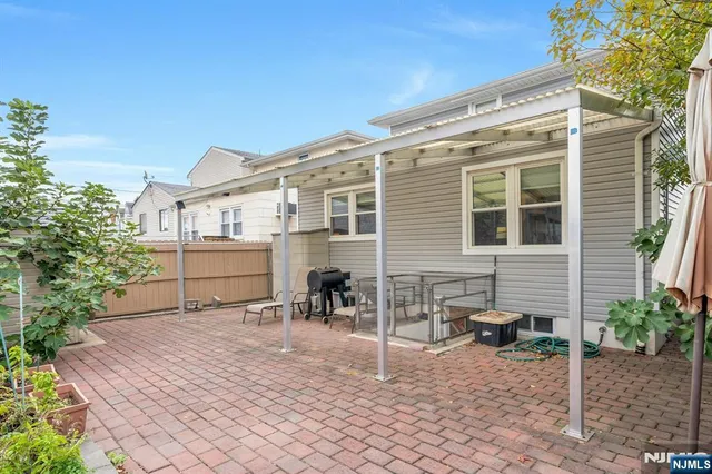 a view of house with outdoor seating space