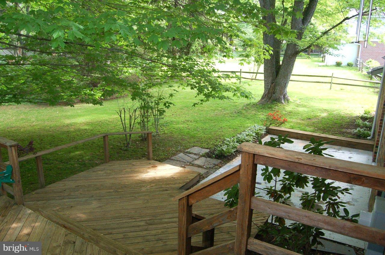 2634 Melba Road Ellicott City, MD 21042 - Photo 27 of 29 Deck and Patio Area leading to Large Flat Backyard