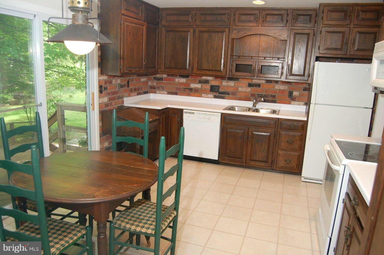 2634 Melba Road Ellicott City, MD 21042 - Photo 9 of 29 Kitchen with Slider to Deck