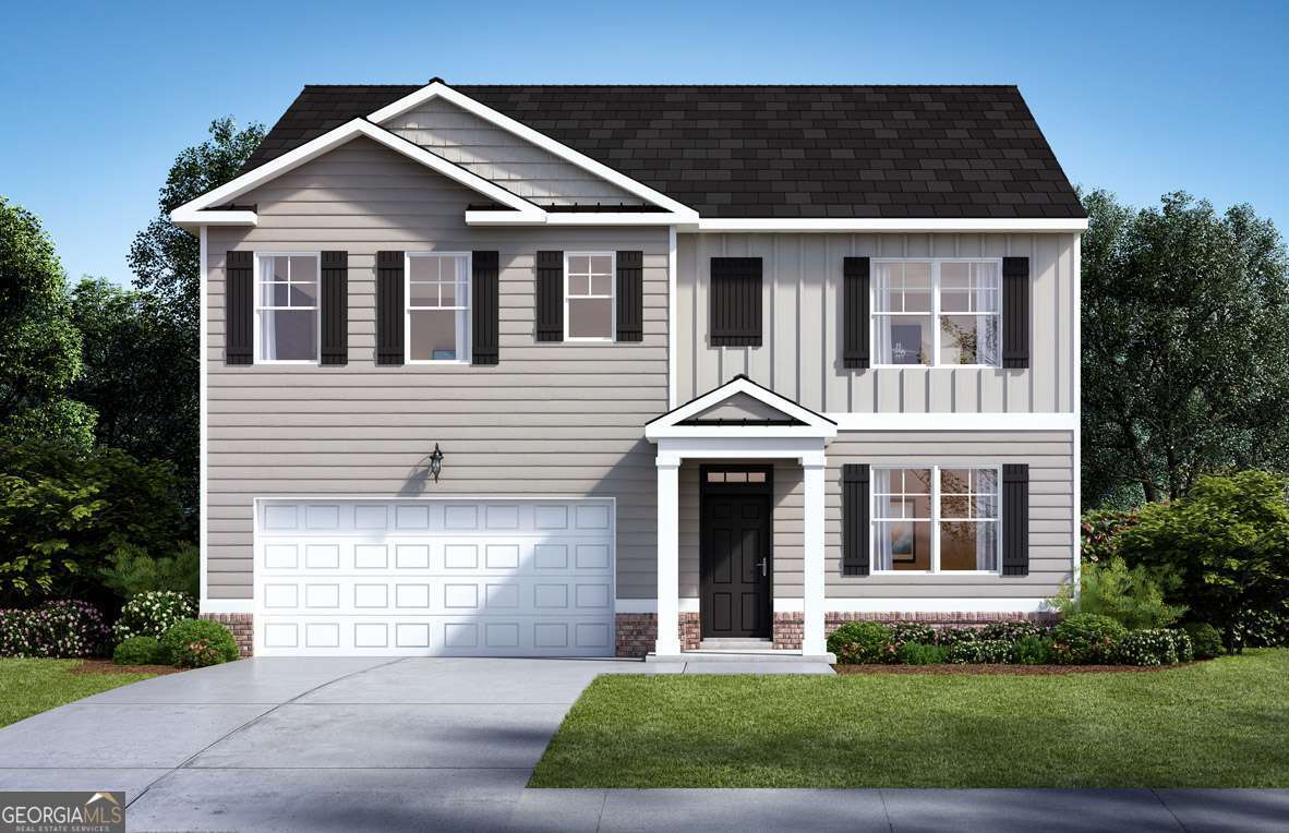 100 Planters Row Perry, GA 31069 - Photo 1 of 37 a front view of a house with a yard and garage