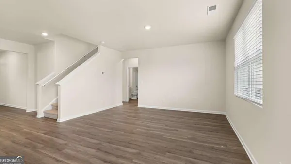 a view of a room with racks on the wall