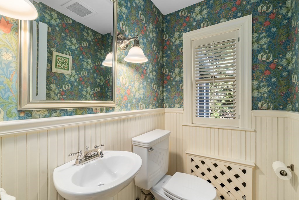 74 Shaw Road Belmont, MA 02478 - Photo 15 of 31 a bathroom with a sink a toilet and a window