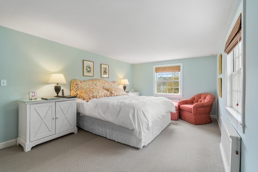 74 Shaw Road Belmont, MA 02478 - Photo 16 of 31 a bedroom with a bed and a couch
