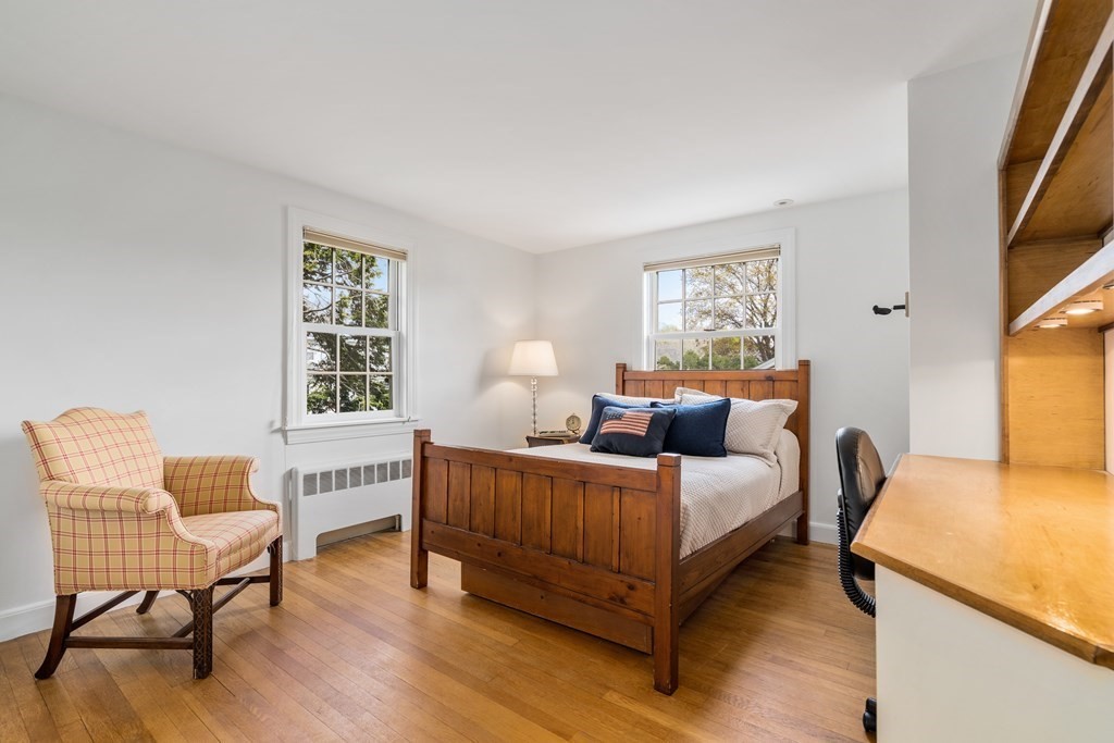 74 Shaw Road Belmont, MA 02478 - Photo 20 of 31 a bedroom with a bed chair and a window