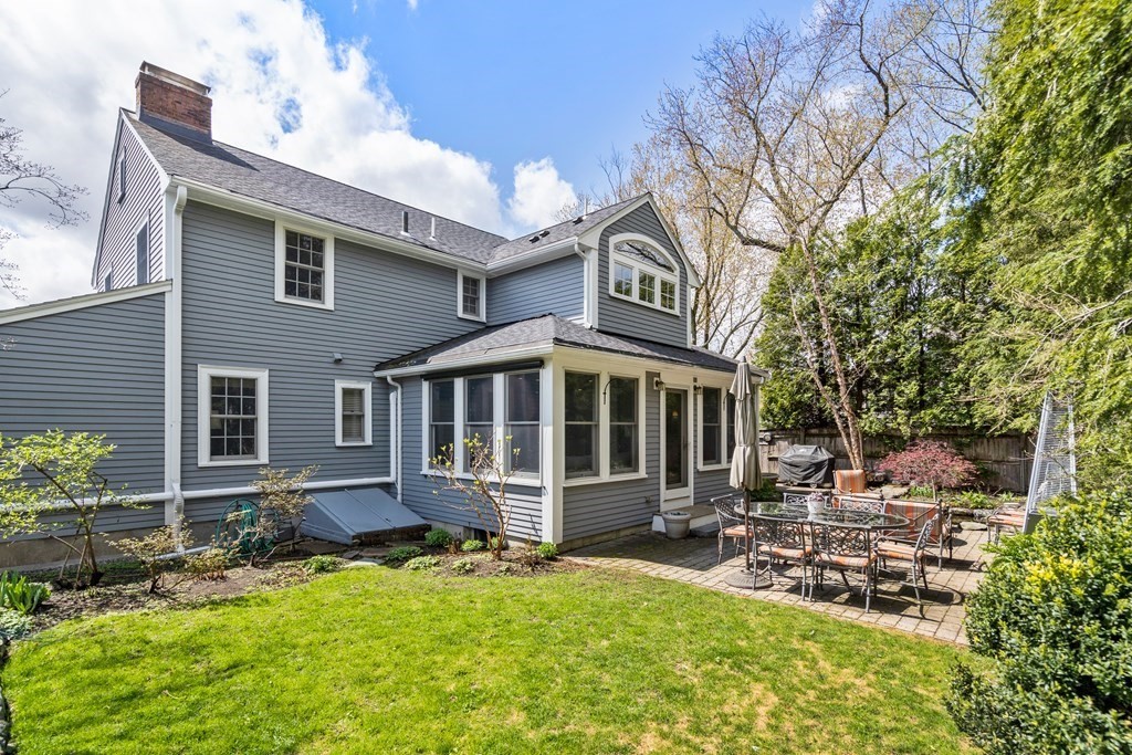 74 Shaw Road Belmont, MA 02478 - Photo 25 of 31 a view of a house with backyard and sitting area