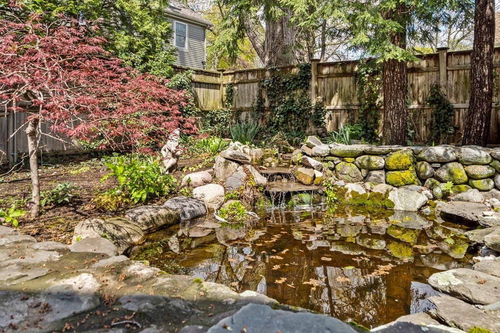 74 Shaw Road Belmont, MA 02478 - Photo 26 of 31 a backyard of a house with lots of green space
