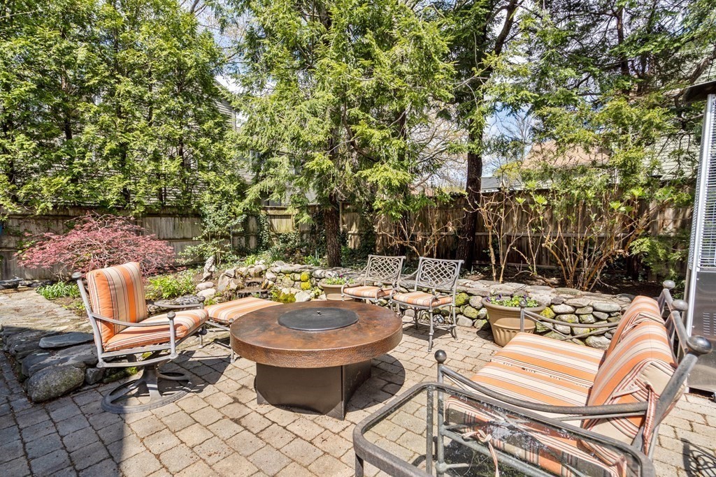 74 Shaw Road Belmont, MA 02478 - Photo 29 of 31 a view of a backyard with swimming pool and sitting area