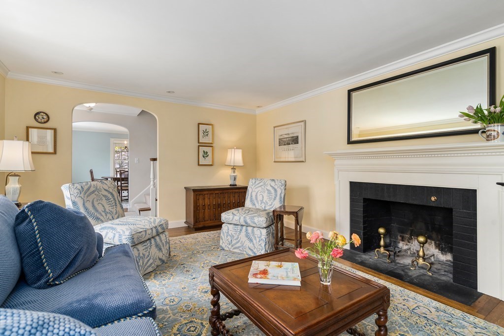 74 Shaw Road Belmont, MA 02478 - Photo 3 of 31 a living room with furniture and a fireplace