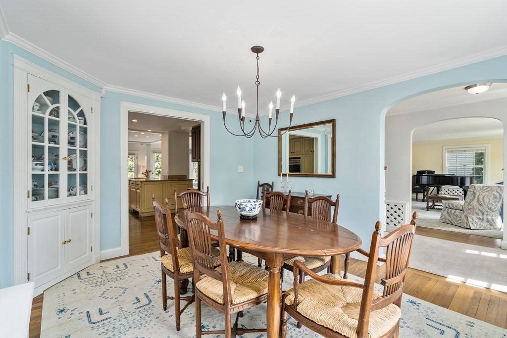 74 Shaw Road Belmont, MA 02478 - Photo 5 of 31 a view of a dining room with furniture and chandelier