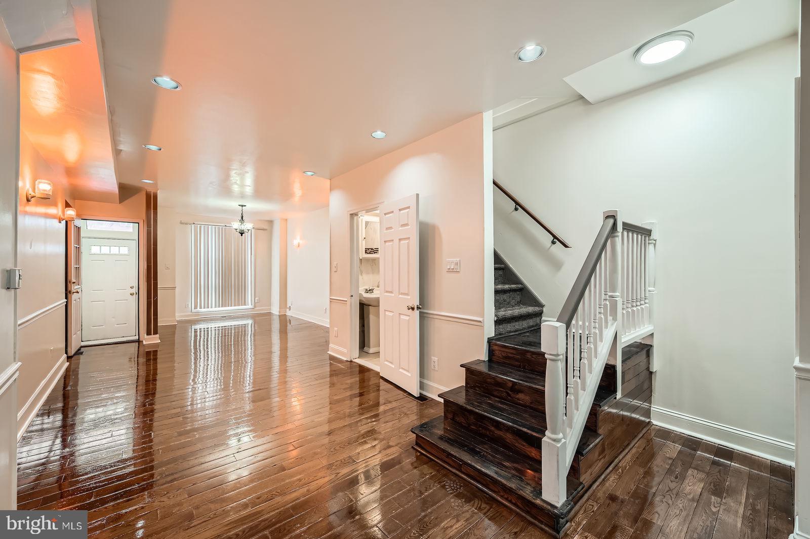 2015 East North Avenue Baltimore, MD 21213 - Photo 17 of 34 a view of entryway with wooden floor and stairs