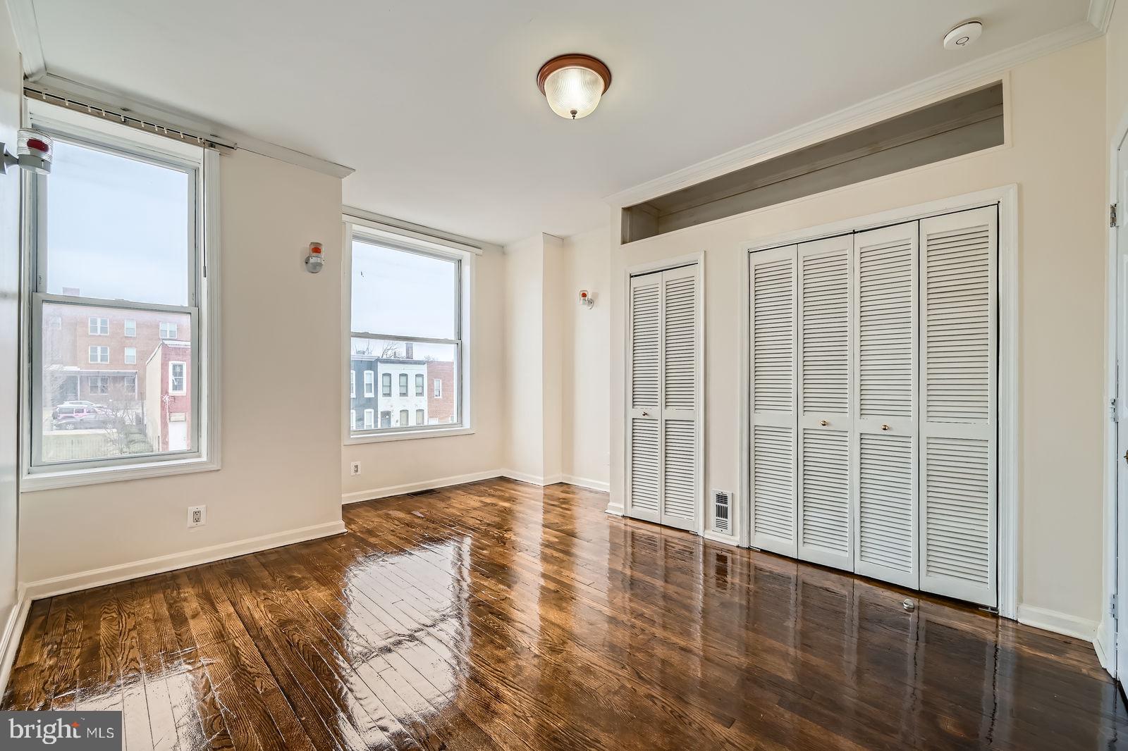 2015 East North Avenue Baltimore, MD 21213 - Photo 18 of 34 a view of an empty room with a window