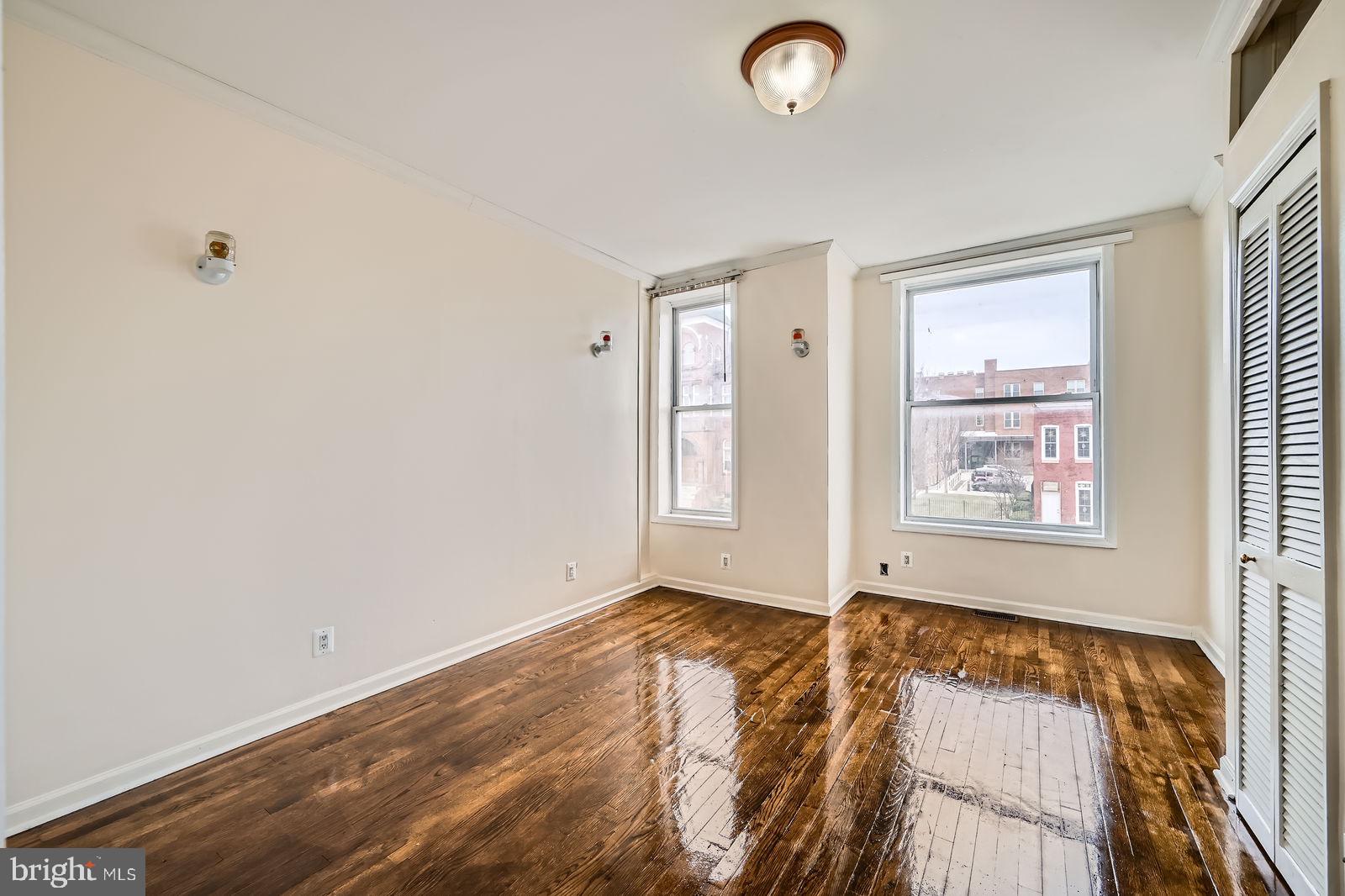 2015 East North Avenue Baltimore, MD 21213 - Photo 19 of 34 a view of room with window and ceiling fan