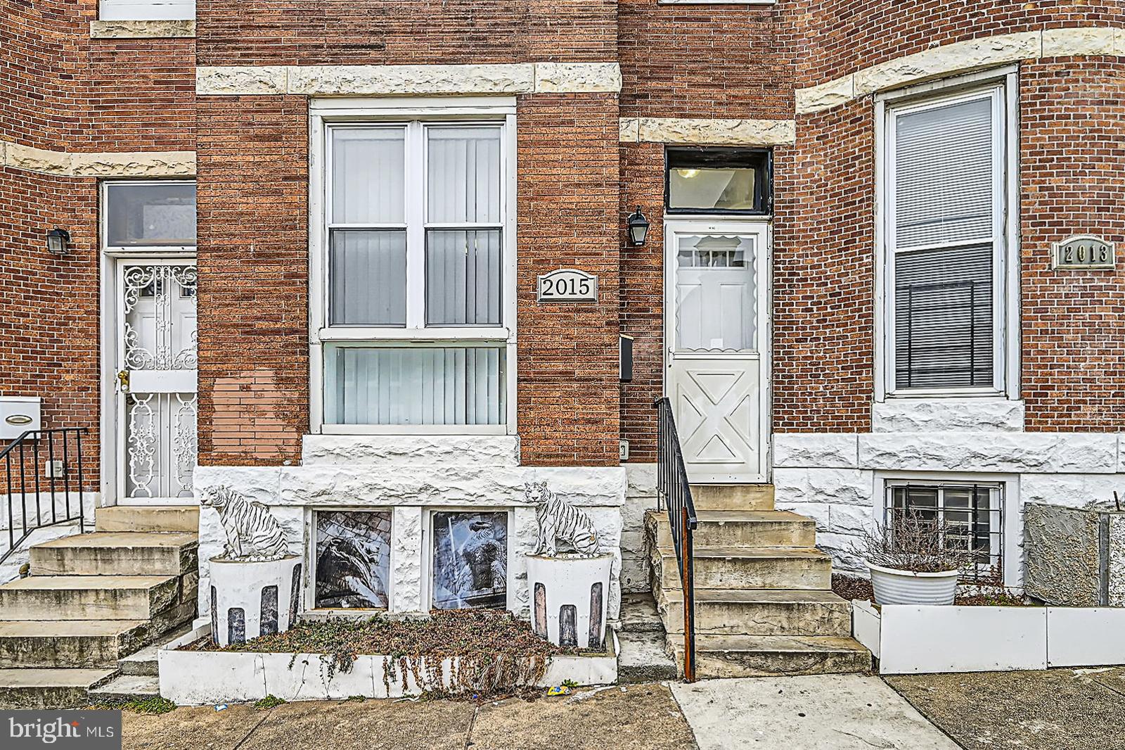 2015 East North Avenue Baltimore, MD 21213 - Photo 34 of 34 front view of a brick house with large windows