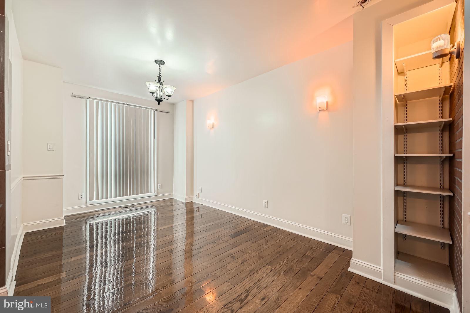2015 East North Avenue Baltimore, MD 21213 - Photo 7 of 34 a view of an empty room with a window