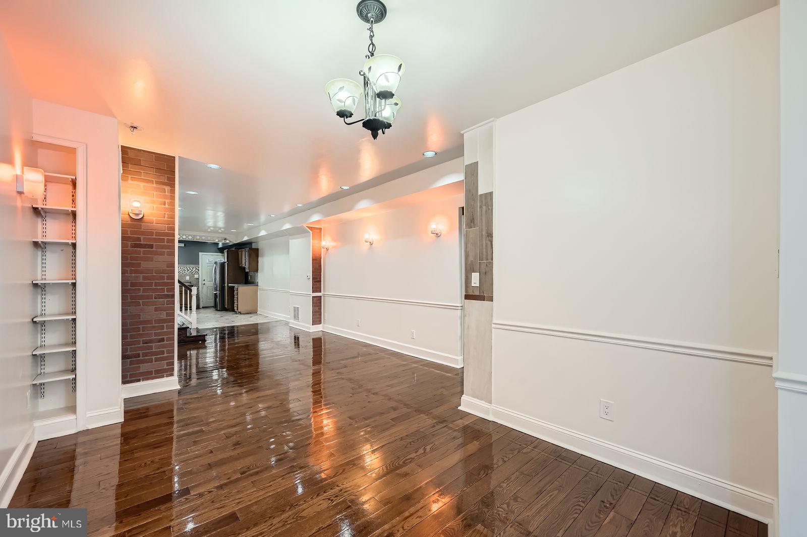 2015 East North Avenue Baltimore, MD 21213 - Photo 8 of 34 a view of dining room with wooden floor
