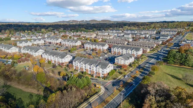 a view of a garden with a building