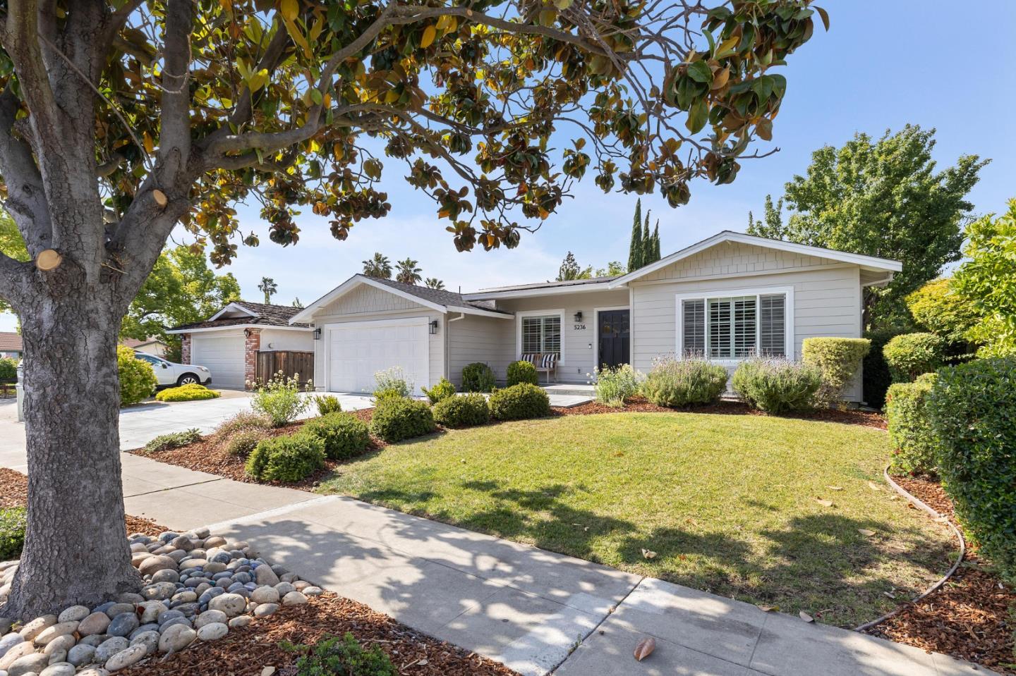 5236 Roxanne Drive San Jose, CA 95124 - Photo 2 of 35 a front view of a house with a yard