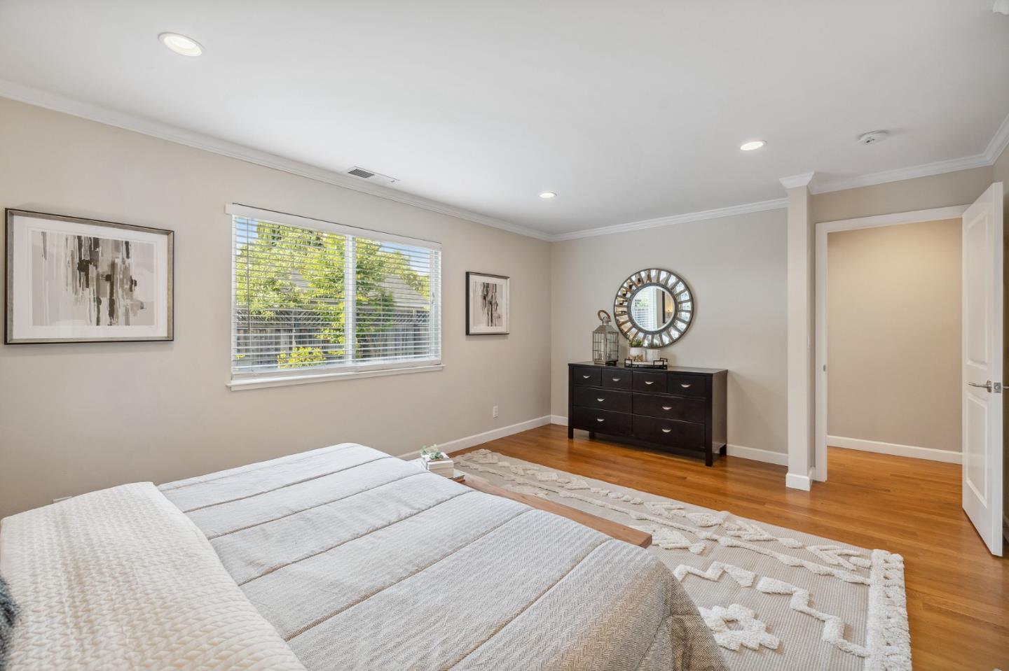 5236 Roxanne Drive San Jose, CA 95124 - Photo 21 of 35 a bedroom with a bed and a dresser