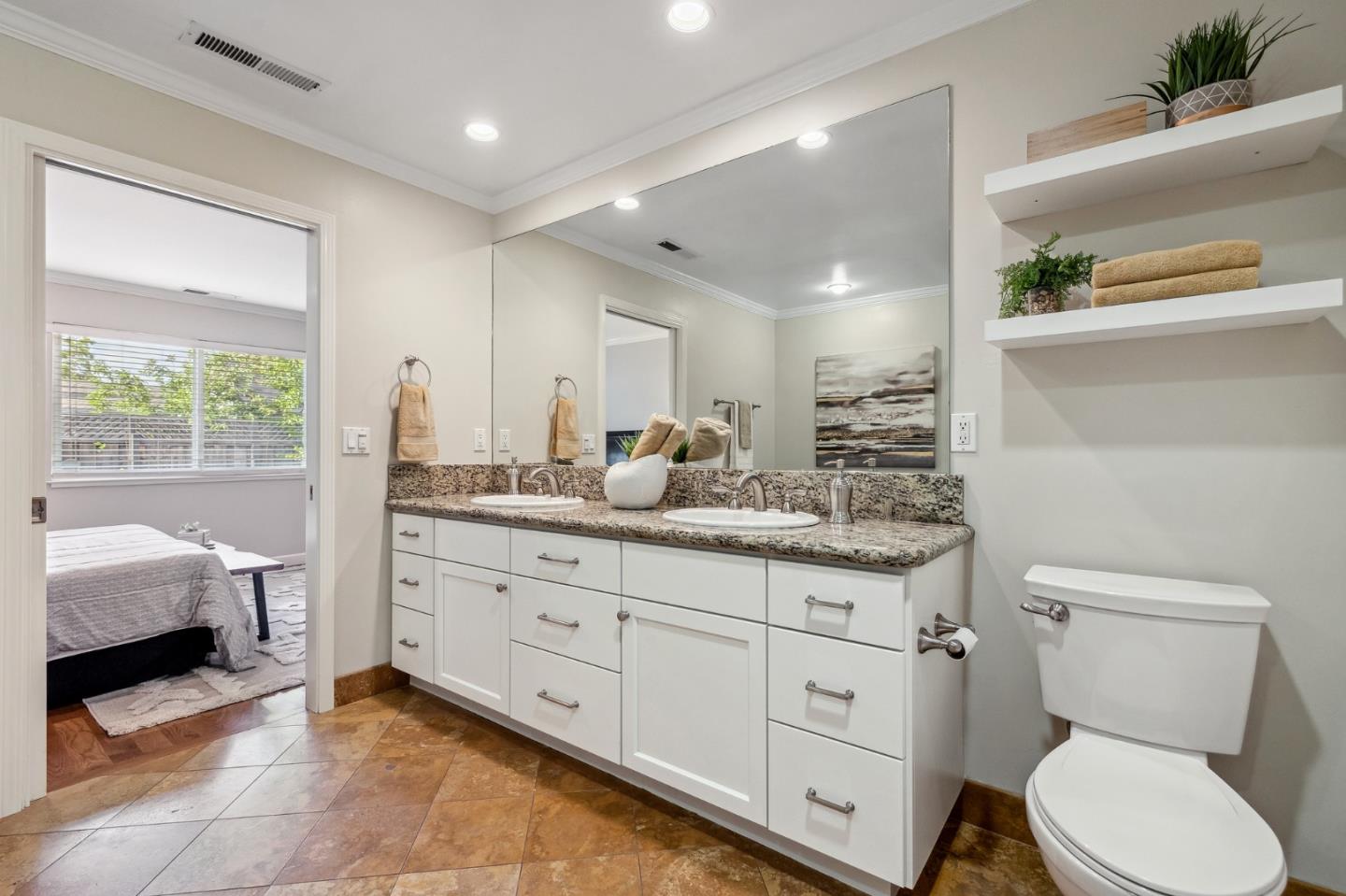 5236 Roxanne Drive San Jose, CA 95124 - Photo 24 of 35 a bathroom with a granite countertop toilet sink and mirror