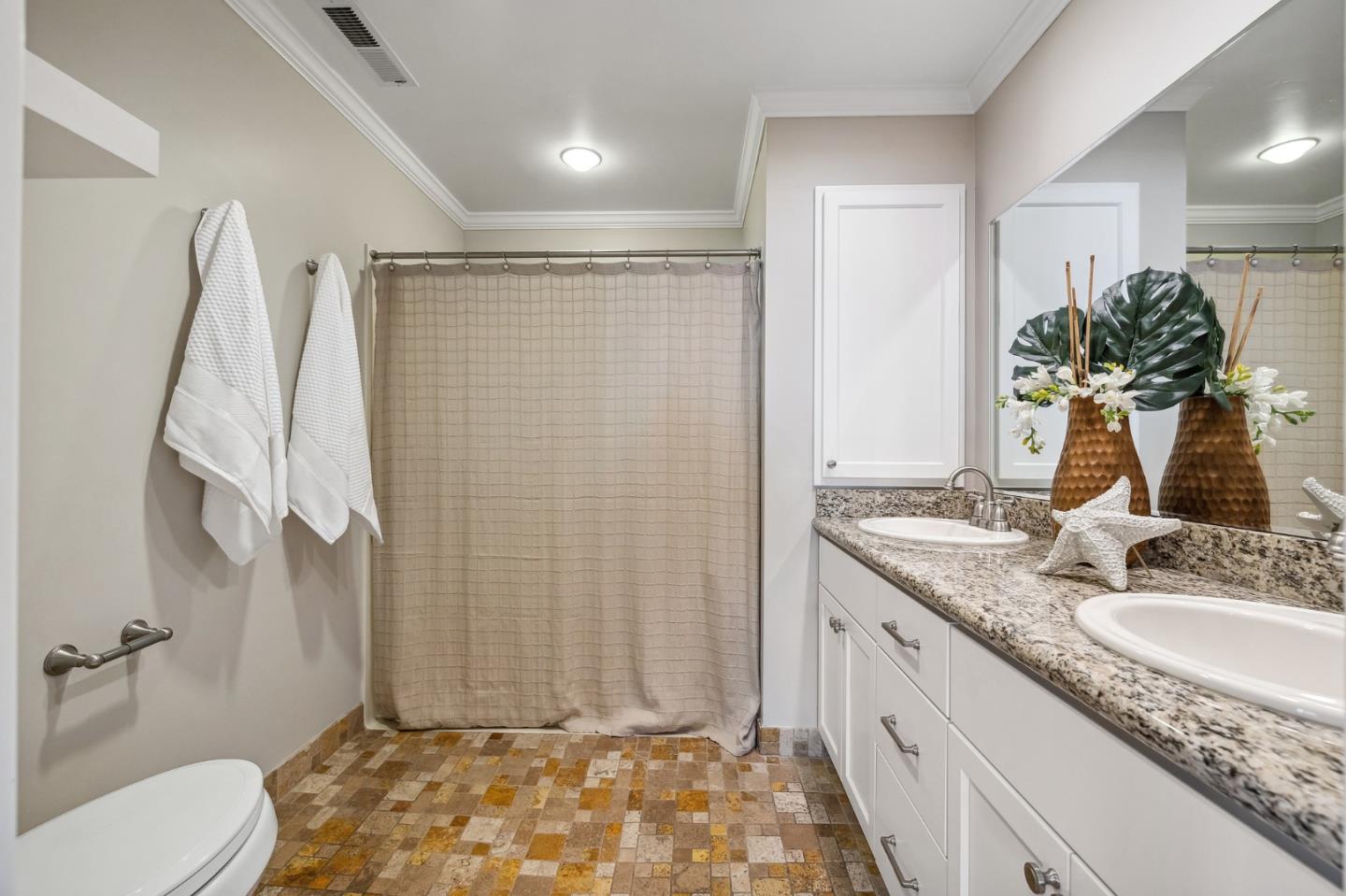 5236 Roxanne Drive San Jose, CA 95124 - Photo 28 of 35 a bathroom with a granite countertop sink toilet and shower