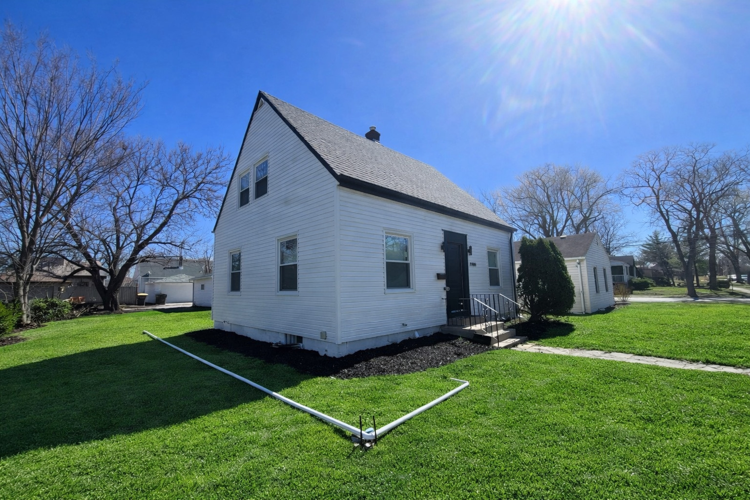 a view of a backyard with a garden