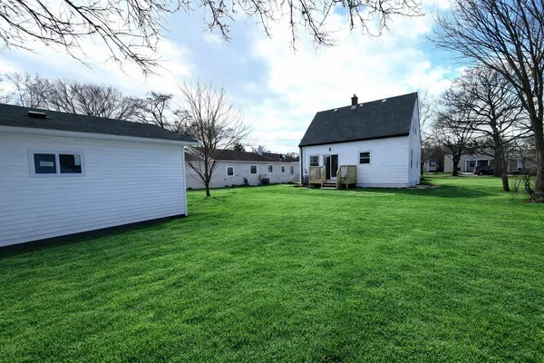 a view of a backyard with a garden