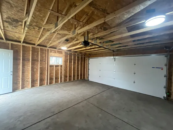 a view of a room with wooden walls