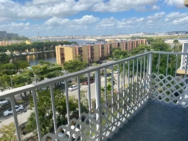 a view of a balcony with city view