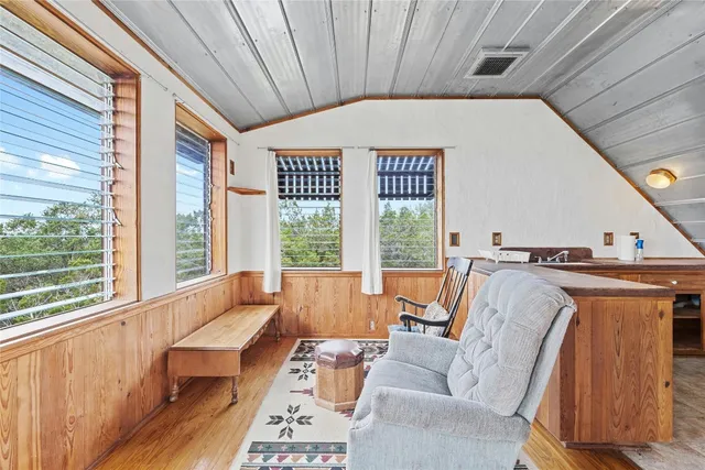 a view of a livingroom with furniture