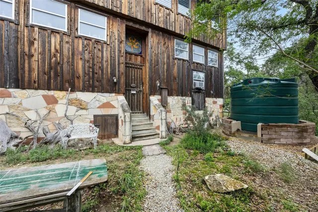 a backyard of a house with lots of green space