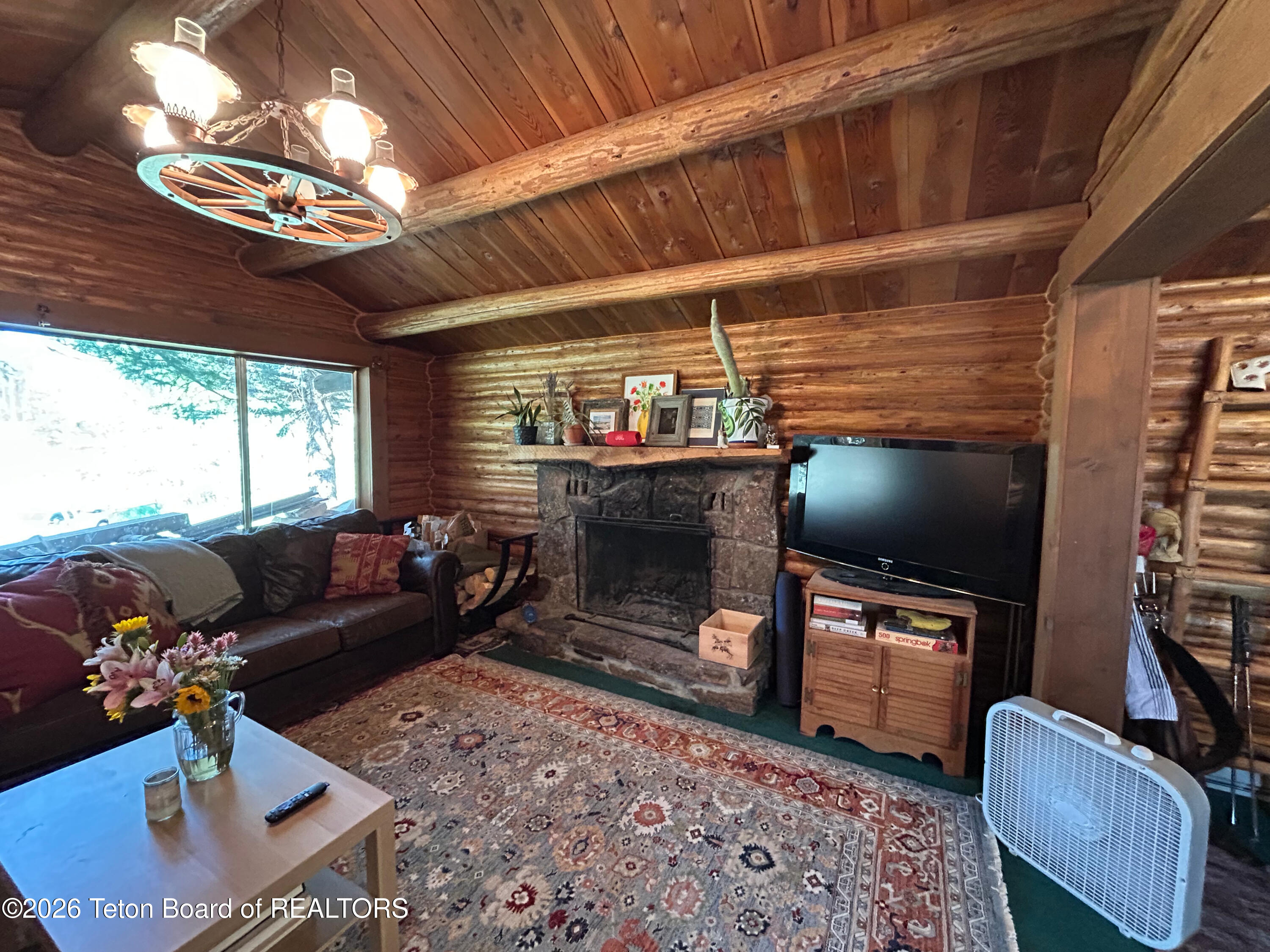 3905 North Fork Fall Creek Road Wilson, WY 83014 - Photo 10 of 26 10 Living Room Fireplace