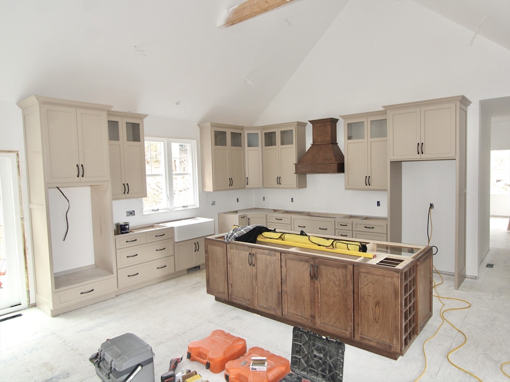 558 Haynes Street Sturbridge, MA 01566 - Photo 2 of 5 a kitchen with stainless steel appliances granite countertop a sink a stove and a refrigerator