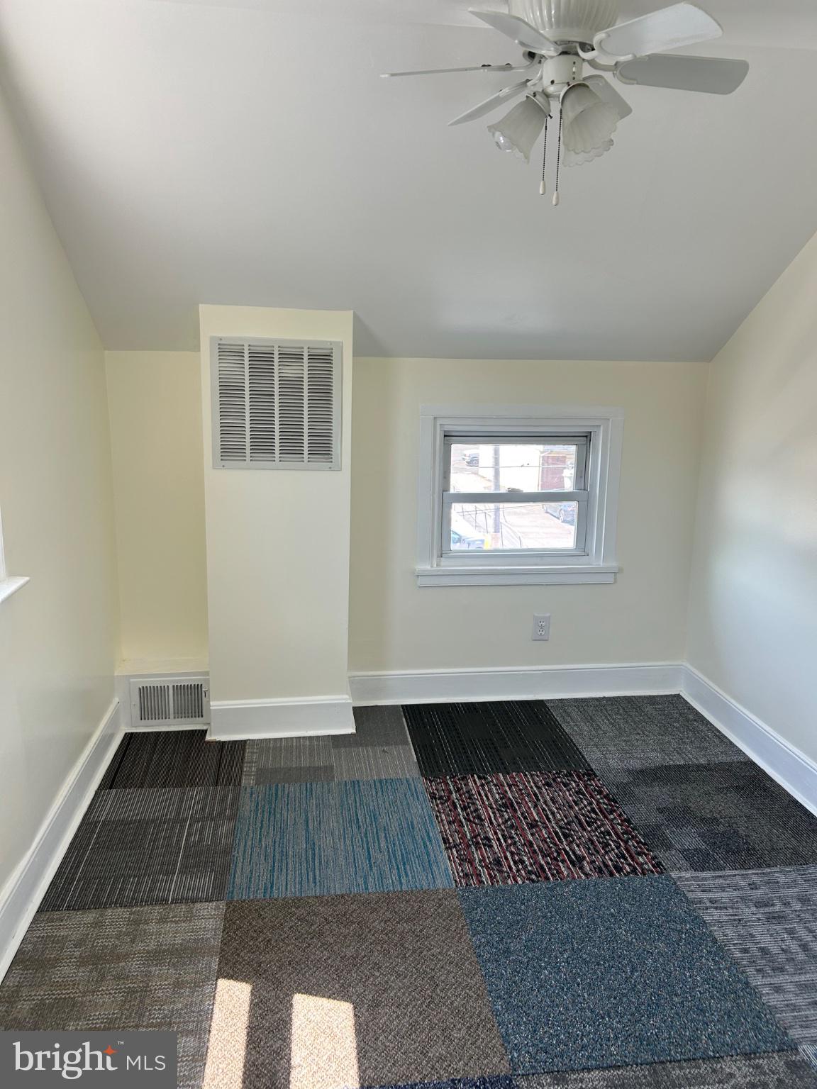 431 Rhawn Street Philadelphia, PA 19111 - Photo 8 of 12 Bright, airy room with unique flooring.