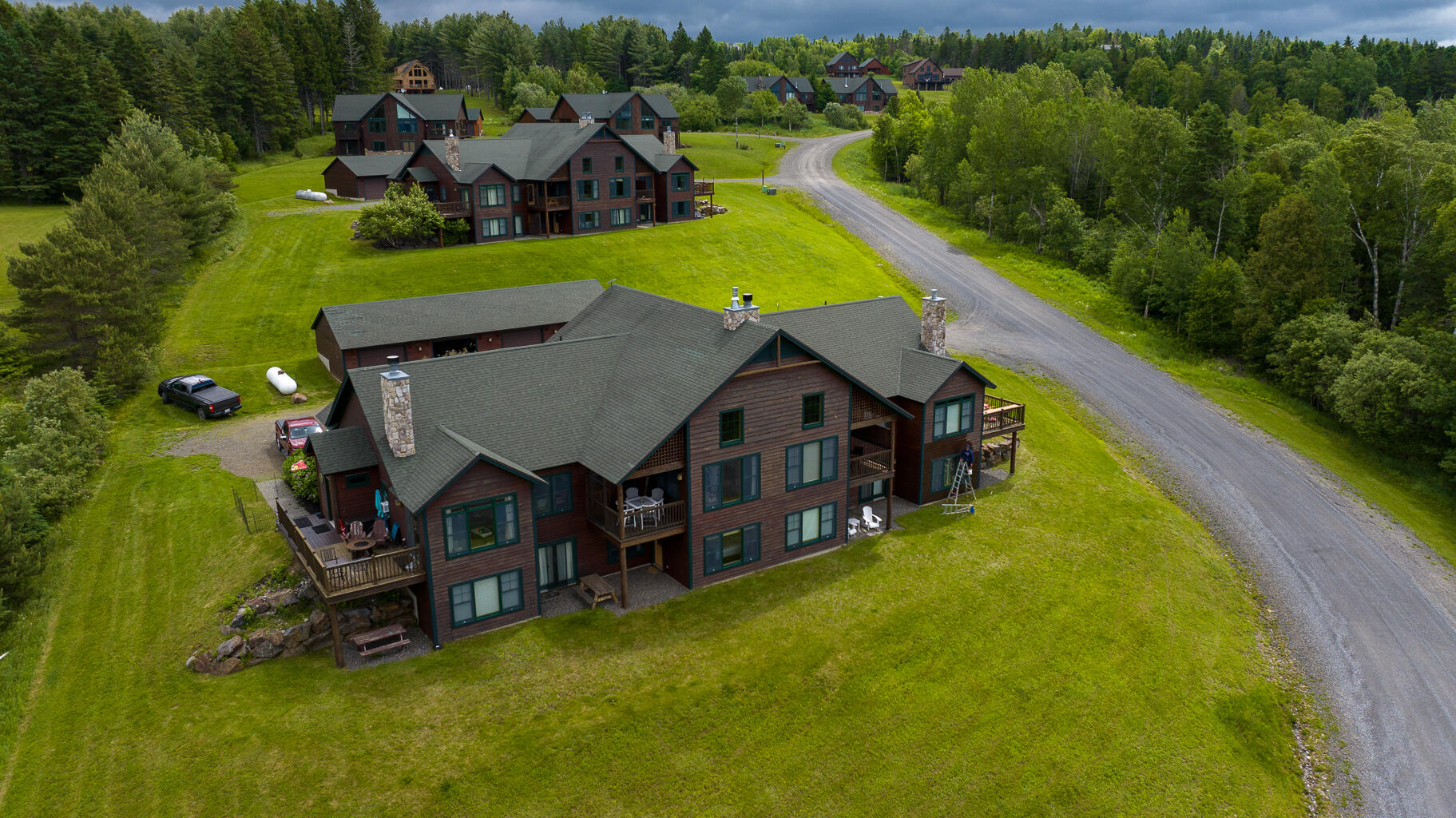 26 Whip Willow Farm Road, Unit 10 Rangeley, ME 04970 - Photo 33 of 35 Back of building