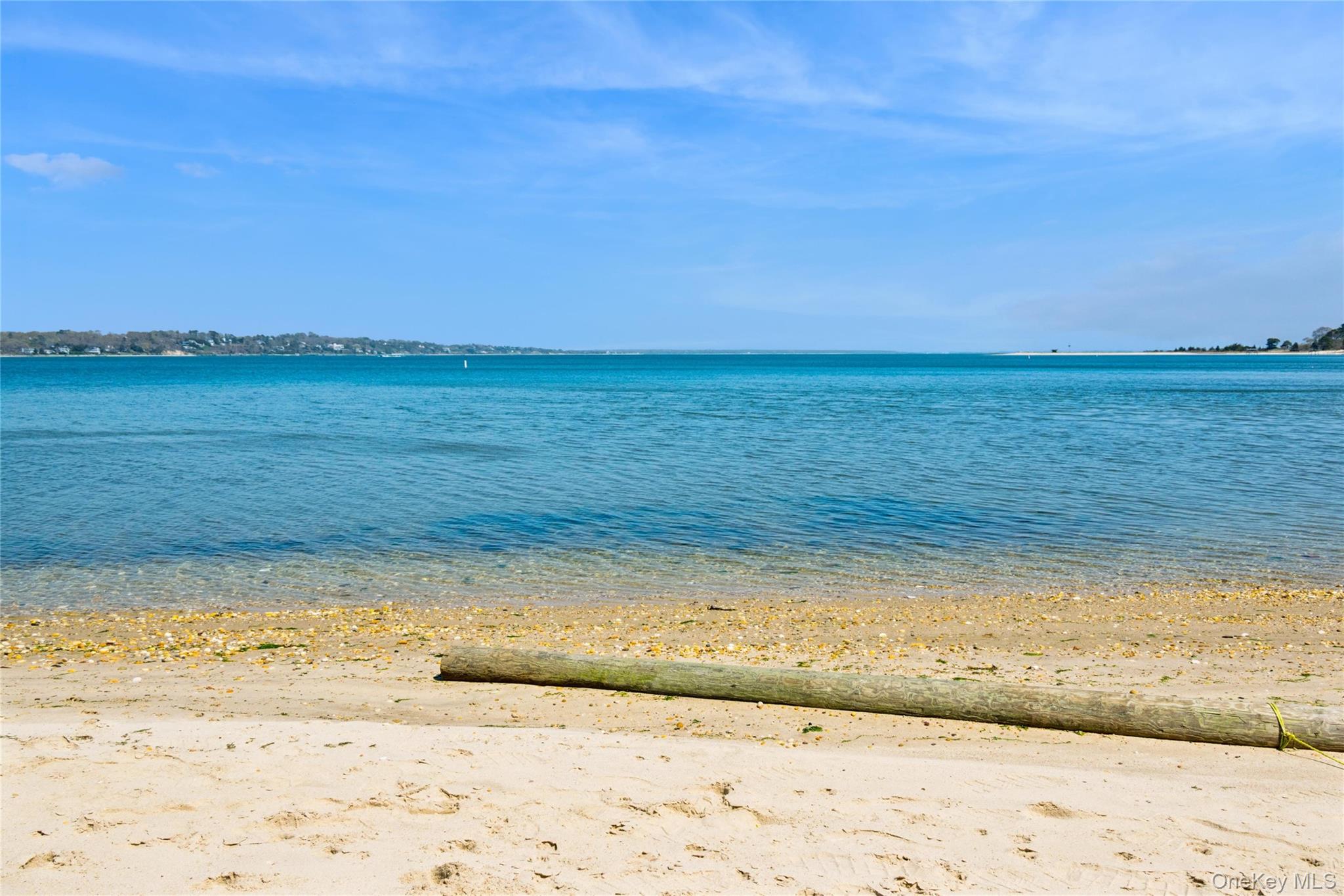 57 Kyle Road Hampton Bays, NY 11946 - Photo 18 of 19 a view of an ocean beach