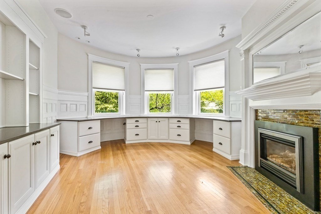 1 Clinton Path, Unit 2 Brookline, MA 02445 - Photo 21 of 28 a large white kitchen with a large window