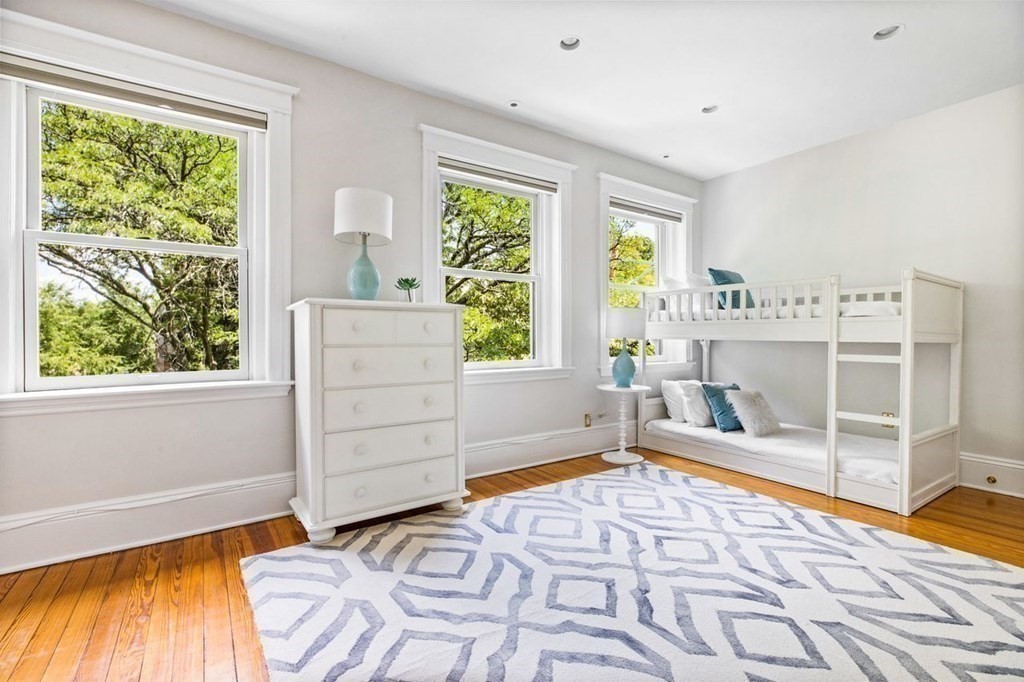 1 Clinton Path, Unit 2 Brookline, MA 02445 - Photo 23 of 28 a bedroom with a bed and a window