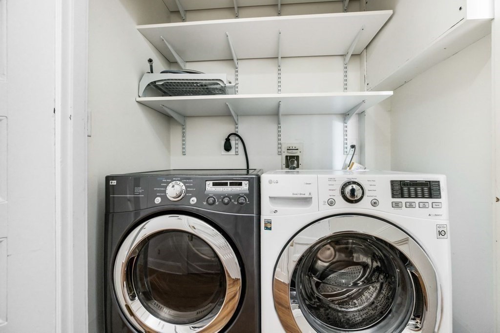1 Clinton Path, Unit 2 Brookline, MA 02445 - Photo 28 of 28 a utility room with dryer and washer