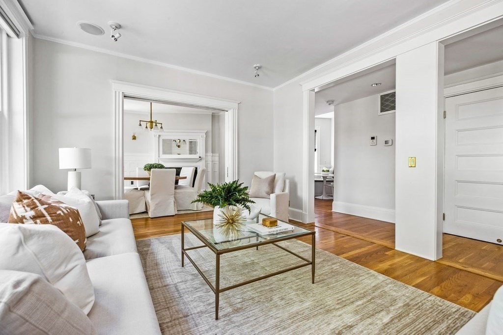 1 Clinton Path, Unit 2 Brookline, MA 02445 - Photo 5 of 28 a living room with furniture and wooden floor